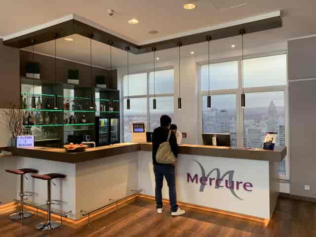 Modern reception area at Le Méridien Frankfurt for networking events and meetings.