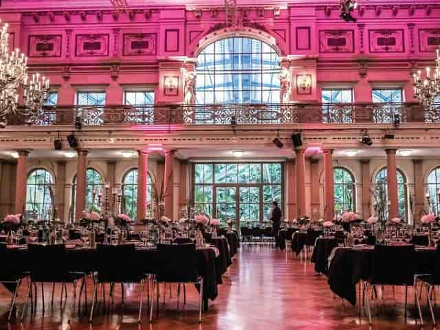 Elegant Emporensaal event space with floral centerpieces for weddings or corporate events.