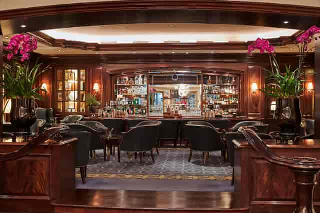 Hofgarten Restaurant bar, elegant decor for networking events and gatherings.