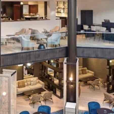 Modern multi-level event space at Main Tapas Lounge, ideal for conferences and social gatherings.