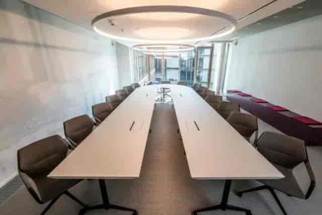 Modern meeting room in Satellite Office Frankfurt, featuring a sleek conference table.