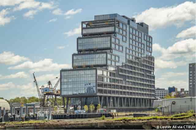 Modern Dock 72 venue with large windows, ideal for corporate events and meetings.