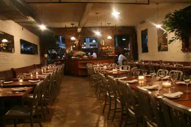 Cozy Peasant restaurant with rustic decor, perfect for intimate gatherings and events.