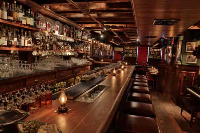 Stylish bar at The Dead Rabbit, ideal for cocktail receptions and networking events.