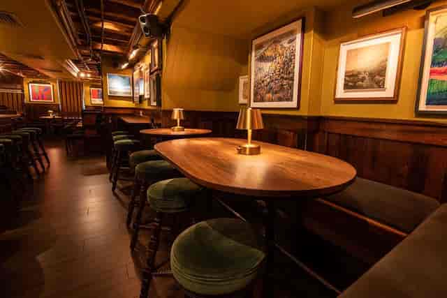"Cozy Second Floor Buyout at The Dead Rabbit, ideal for private meetings and events."