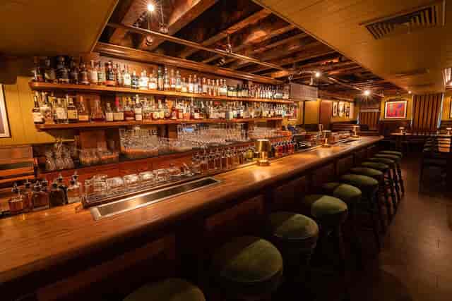 Cozy bar at The Dead Rabbit, ideal for networking and social gatherings.