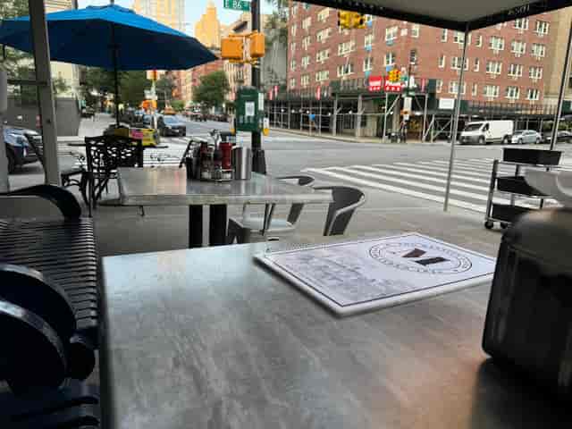 Outdoor dining setup at The Mansion restaurant for casual meetings or brunch gatherings.