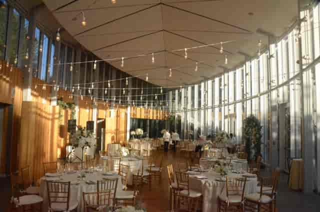 Elegant banquet hall at Garden House NYC with floral centerpieces for weddings or events.