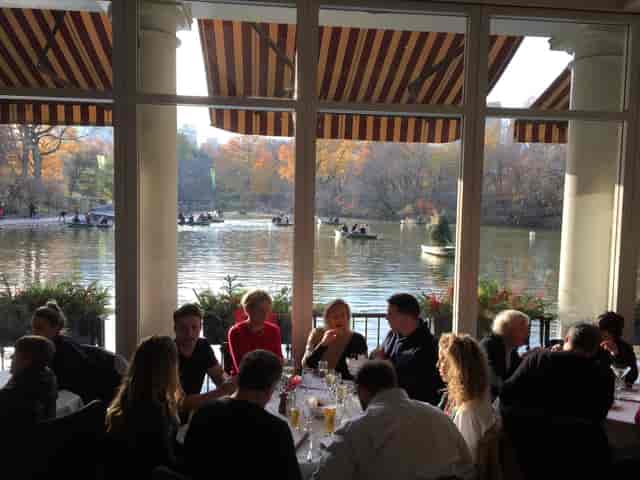 Bar at Central Park Boathouse, vibrant dining by waterfront, ideal for corporate events.
