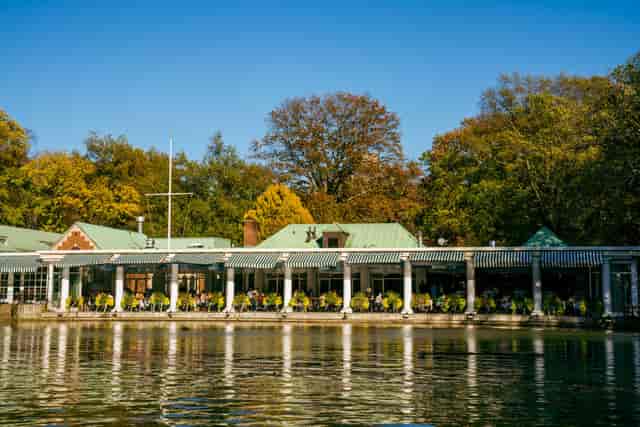 Outdoor patio at Central Park Boathouse, ideal for events with lush greenery and serene views.
