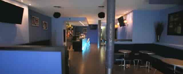 Modern banquet hall in Ascent Lounge, featuring cool blue tones for cocktail receptions.