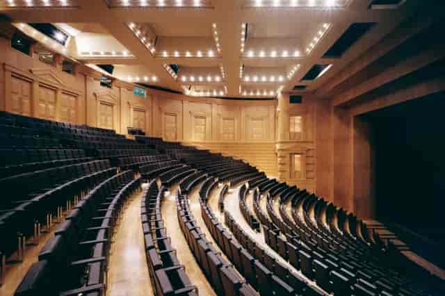 Main foyer at Teatre Nacional de Catalunya with tiered seating for conferences.