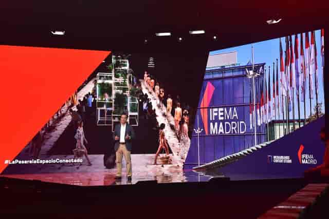 "Dynamic multi-purpose space at IFEMA Madrid with vibrant lighting for impactful events."