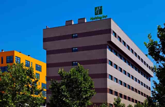 Holiday Inn Madrid - Las Tablas, modern venue for events and meetings amidst greenery.