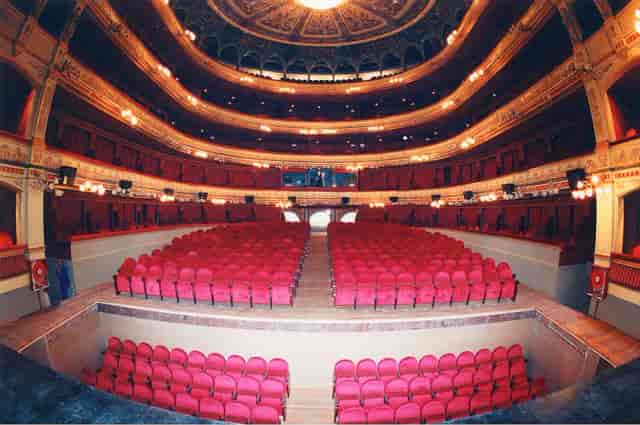 Elegant tiered auditorium in Teatro Calderón, perfect for events and performances.