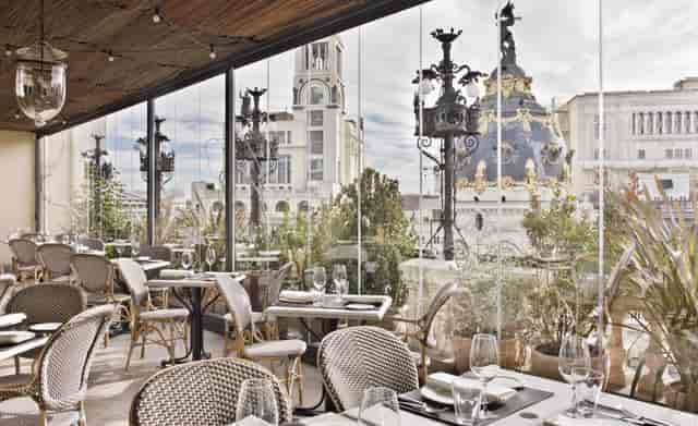Elegant dining space with city views, perfect for corporate meetings and upscale events.