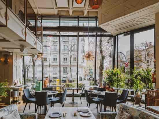 Stylish Sushita venue with large windows, ideal for meetings and events.