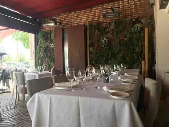 Stylish dining setup at Taberna de Elia for corporate events or private dinners.