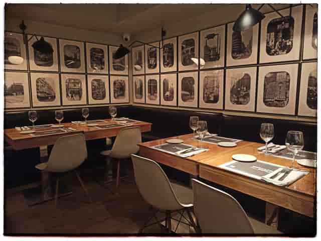 Stylish dining space at Mercado de la Reina for private events and gatherings. 