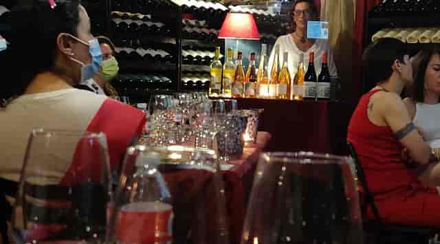 Wine tasting event at La Bodega de los Reyes with elegant table and cozy ambiance.