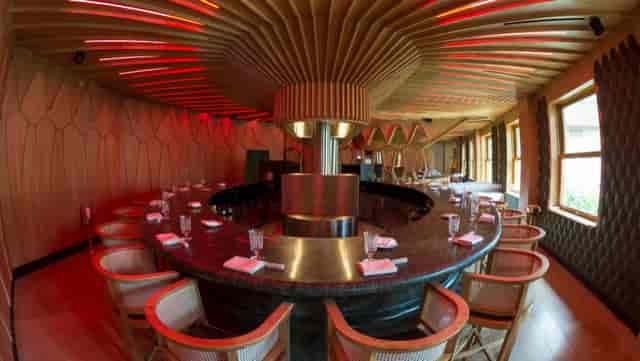 Stylish A'Barra restaurant with circular bar, ideal for exclusive events and intimate dinners.