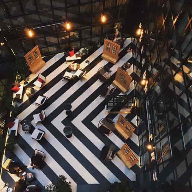 Stylish networking area at Only YOU Hotel Atocha, perfect for casual meetings.