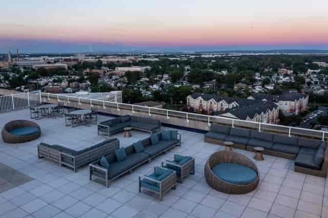 Industrial-chic rooftop bar at Watt Hotel Rahway, perfect for cocktail receptions and events.
