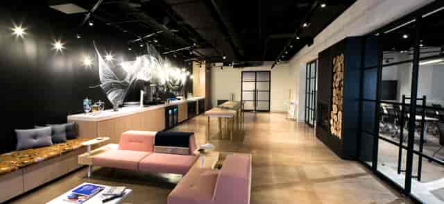 Modern lounge in Convene with sleek finishes, ideal for networking and brainstorming events.