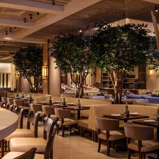 Sophisticated restaurant in Avra Madison with plush seating for private dining events.