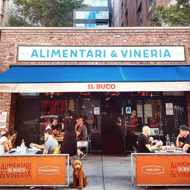 Inviting outdoor dining at Formaggeria, perfect for casual gatherings and networking.