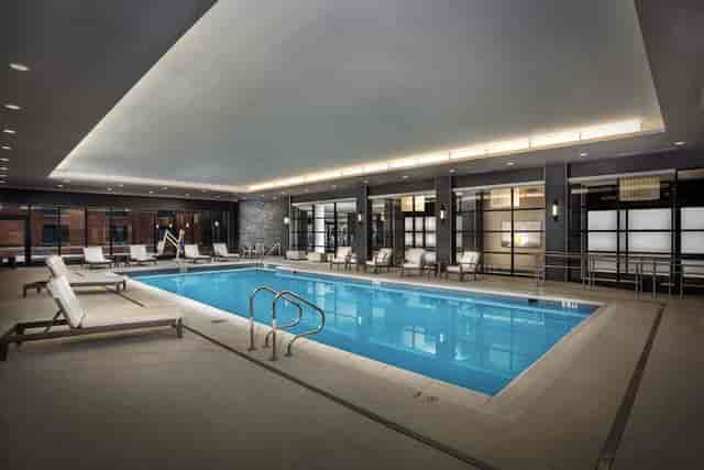 Sleek indoor pool at Top of the 7s, ideal for wellness retreats and social events.