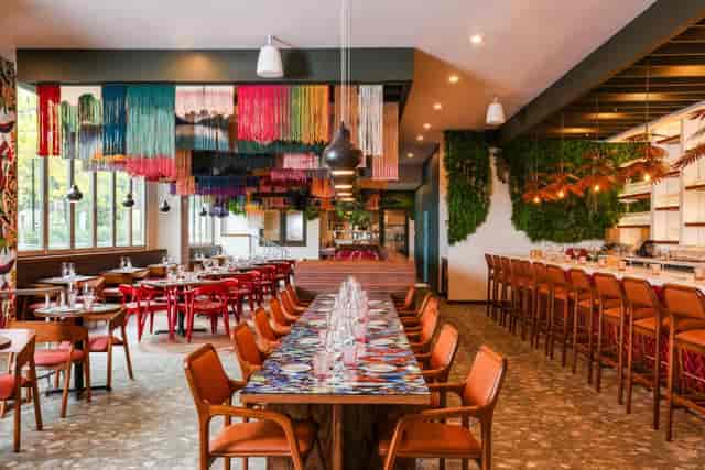 John Carroll Room in 1789 Restaurant, vibrant decor, ideal for events and meetings.