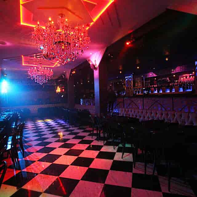 Upscale brunch venue with black and white checkered floor, ideal for events and receptions.
