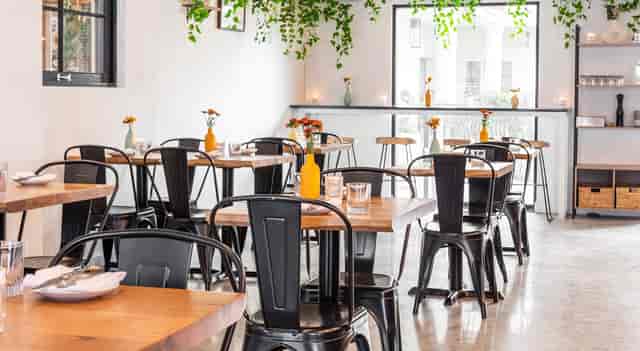 Modern cafe interior at Isla & Co., perfect for networking events and meetings.