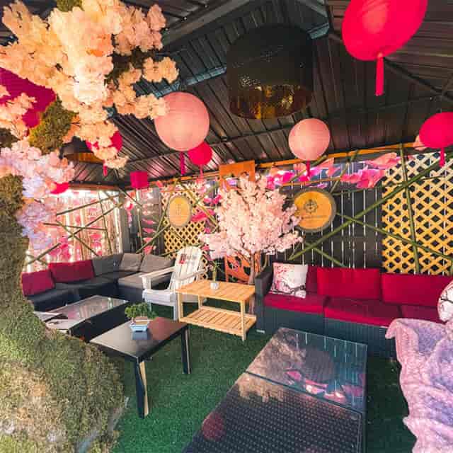Hot Tub Cabana lounge with pink decor, perfect for events and celebrations.