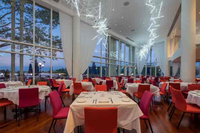 Stylish private dining room with elegant tables for upscale events and gatherings.