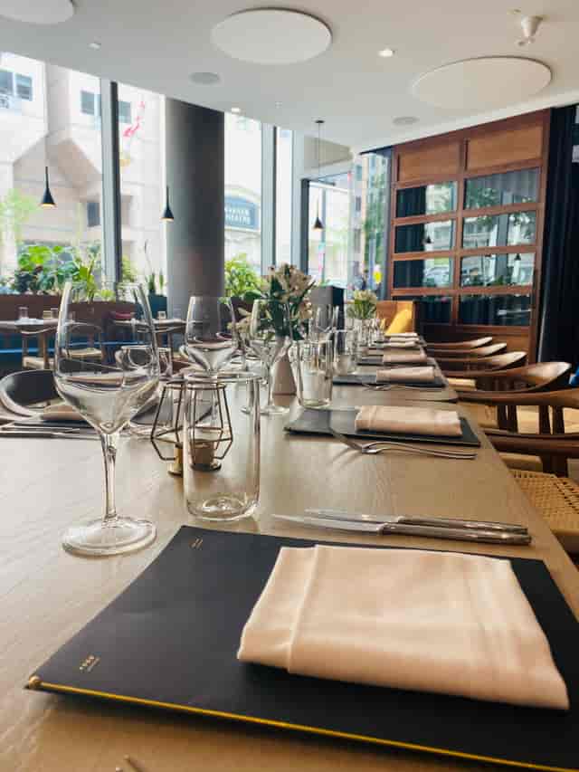 Modern dining area at The Henri DC with elegant table for private events and corporate gatherings.