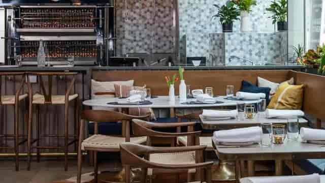 Modern restaurant interior at Seasons in The Henri DC, ideal for events and meetings.