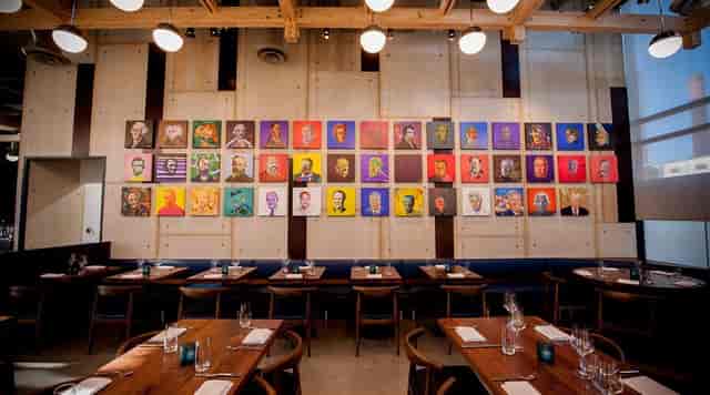 Modern Tasting Bar at District Winery with vibrant art, ideal for events and gatherings.