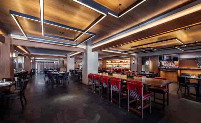 Modern Nobu D.C. bar with warm wood features, perfect for corporate events and social gatherings.