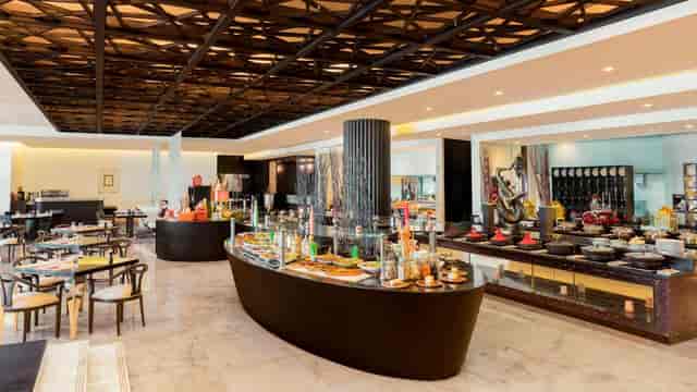 Elegant buffet setup at Sofitel Abu Dhabi for corporate events and social gatherings.