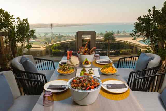 Elegant outdoor dining at Sofitel Abu Dhabi, perfect for gourmet events and gatherings.
