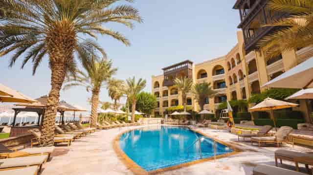 Nisreen by the luxury poolside at Shangri-La Hotel, Abu Dhabi; ideal for outdoor events.