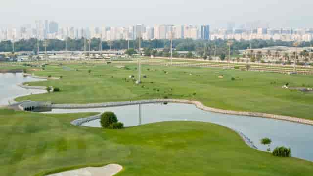 Qanas at Abu Dhabi Golf Club: golf course, lush fairways, event venue, corporate retreats.