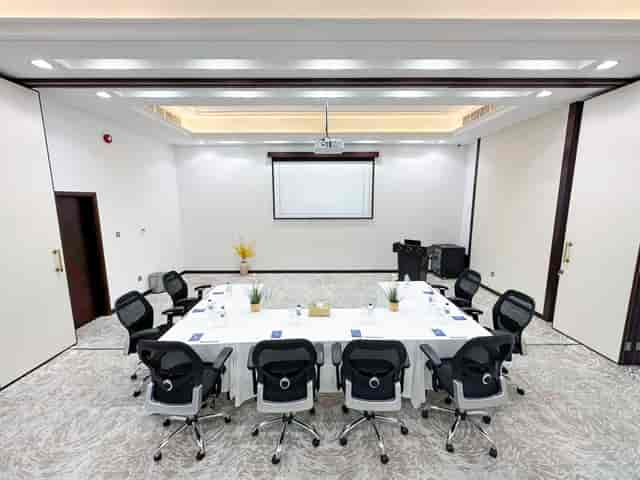 Ballroom in Al Diyafa with U-shaped table, ideal for conferences and meetings.