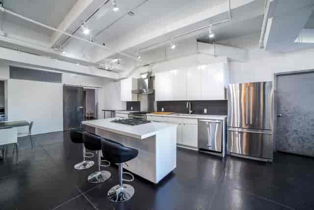 Modern kitchen in Green Room for cooking classes and intimate meetings.