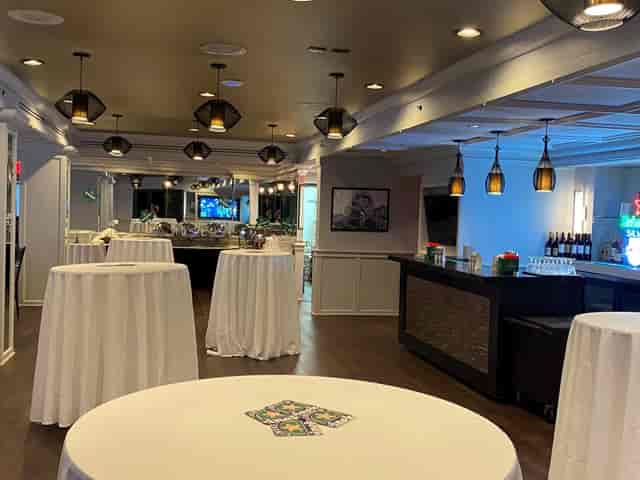 Stylish Taft Bar event space in Manhattan with elegant high-top tables for receptions.