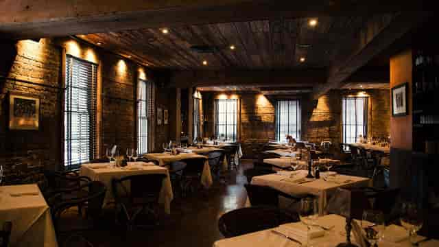 Charming P.J. Clarke's Restaurant interior, warm ambiance for intimate dinners and gatherings.