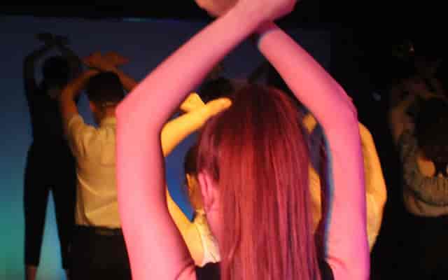 “Group workshop at Dance Studio, North West Theatre: vibrant movement and teamwork.”