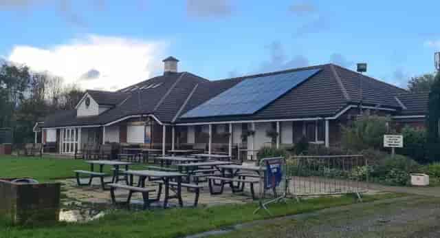 Members Lounge at Unsworth Cricket Club, spacious venue for outdoor events with eco-friendly solar panels.